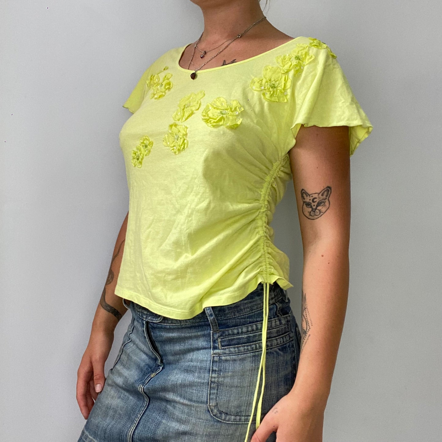 yellow ruched t-shirt with flower detailing