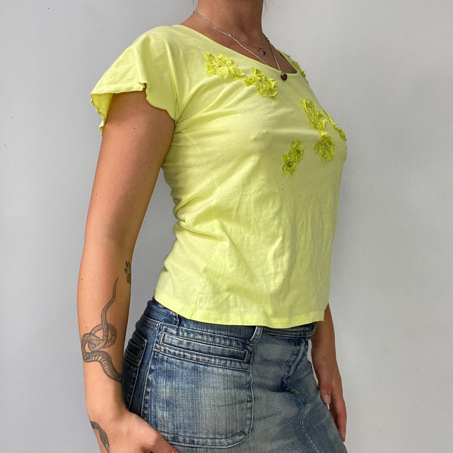 yellow ruched t-shirt with flower detailing
