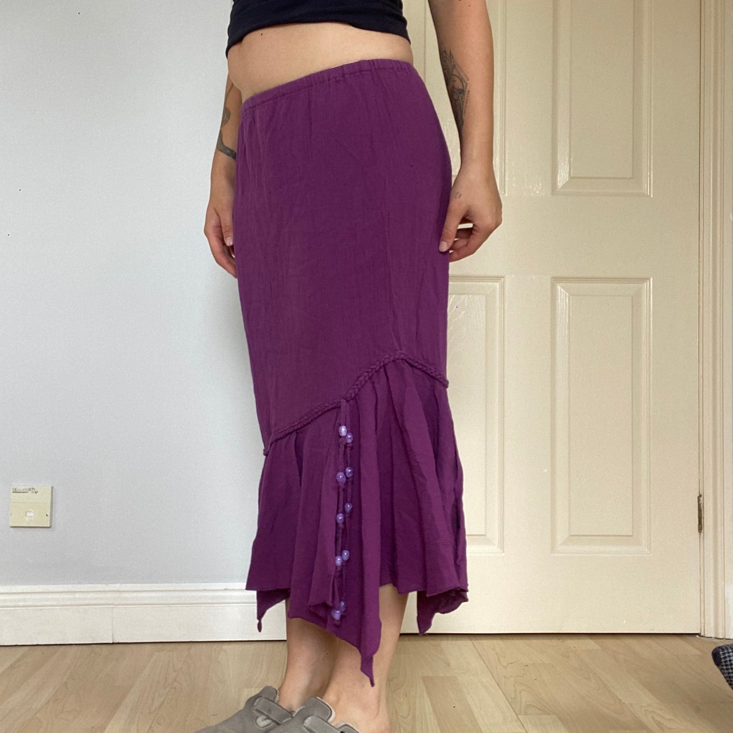 Asymmetric beaded midi skirt