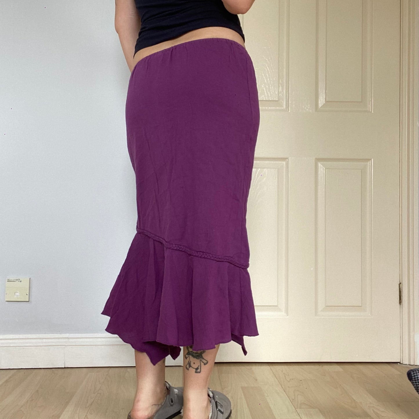 Asymmetric beaded midi skirt